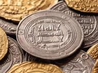 الأثر العقائدي في مدونات النقود الإسلامية 